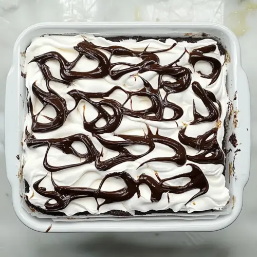 Marshmallow Chocolate Poke Cake