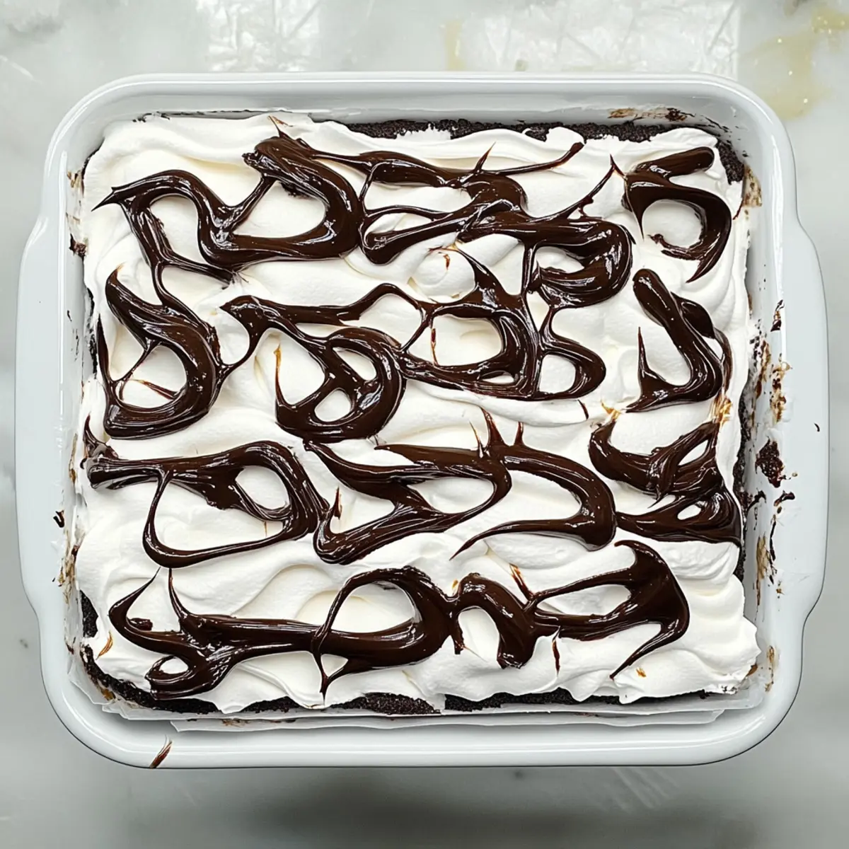 Marshmallow Chocolate Poke Cake